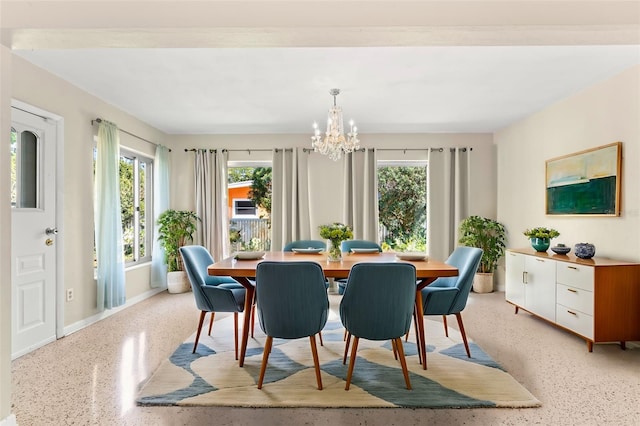 dining area with a chandelier