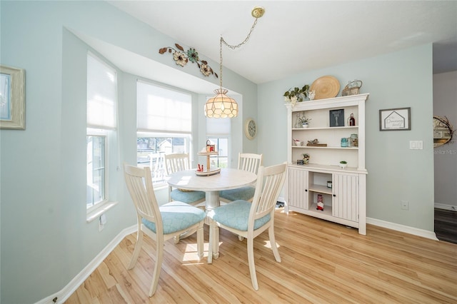 dining room with light hardwood / wood-style flooring