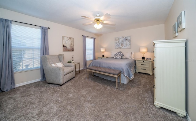 bedroom featuring multiple windows, carpet floors, and ceiling fan