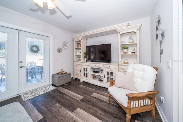 sitting room featuring dark hardwood / wood-style floors, ceiling fan, and french doors