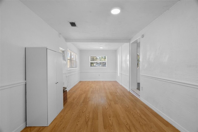 unfurnished room featuring light hardwood / wood-style floors