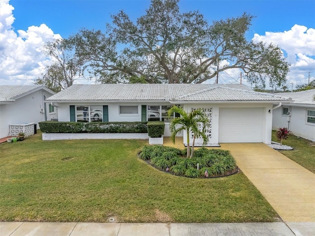 single story home with a garage and a front lawn