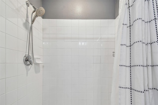 bathroom with curtained shower