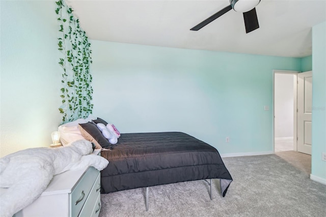 bedroom featuring ceiling fan and light colored carpet