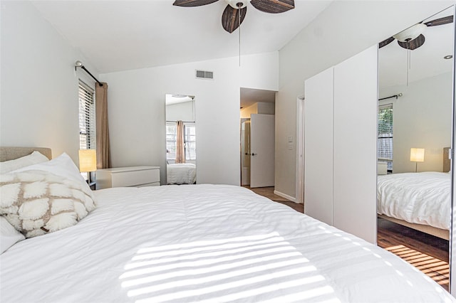 bedroom featuring lofted ceiling and ceiling fan