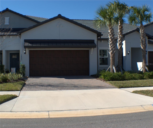 view of front of home featuring a garage