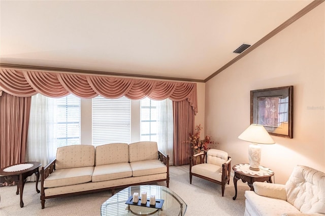 living room featuring lofted ceiling, carpet floors, ornamental molding, and a healthy amount of sunlight