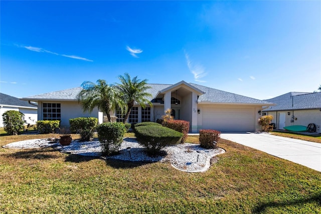 single story home featuring a garage and a front lawn