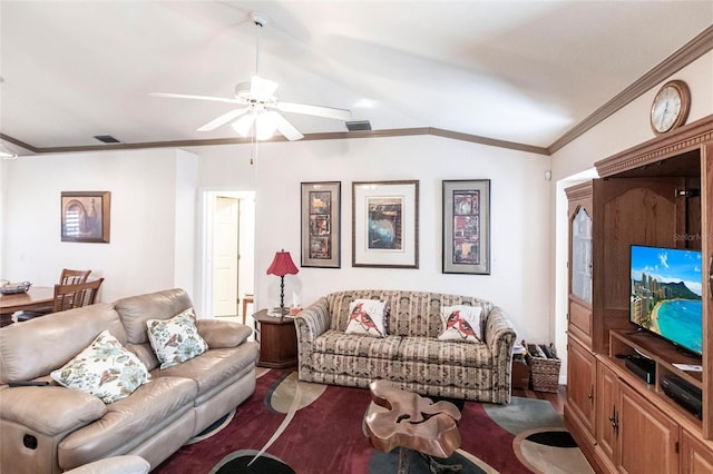 living room with lofted ceiling, ornamental molding, and ceiling fan