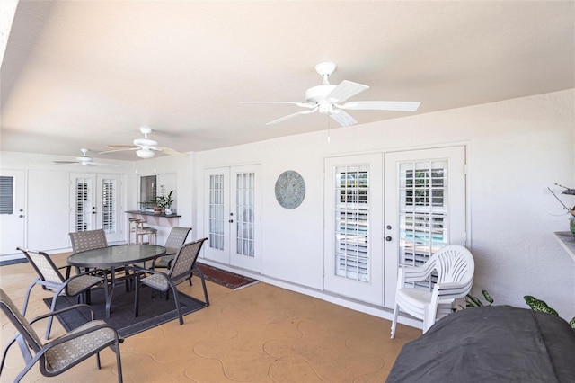 interior space featuring french doors and ceiling fan