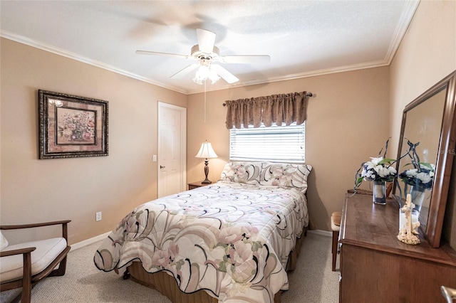 bedroom with ornamental molding, light colored carpet, and ceiling fan