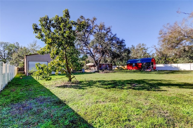 view of yard with a storage shed