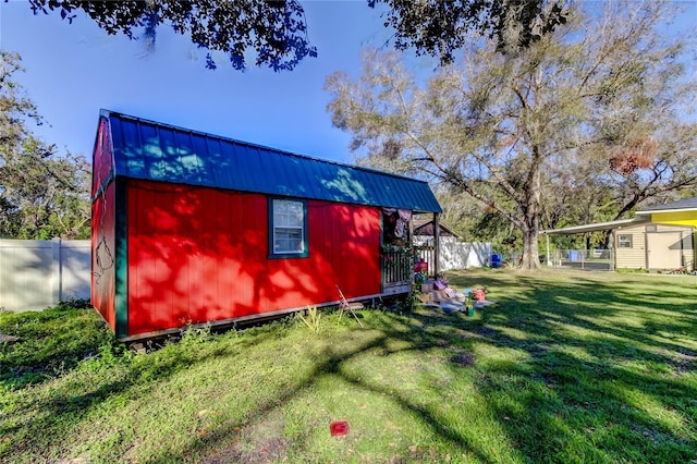 view of outdoor structure with a yard