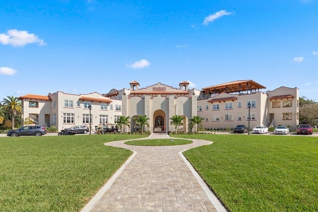 view of front of home with a front yard