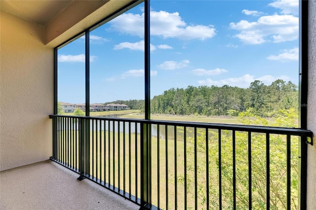 4899 Isola Ct, Wesley Chapel, FL 33543 - unfurnished sunroom with a water view
