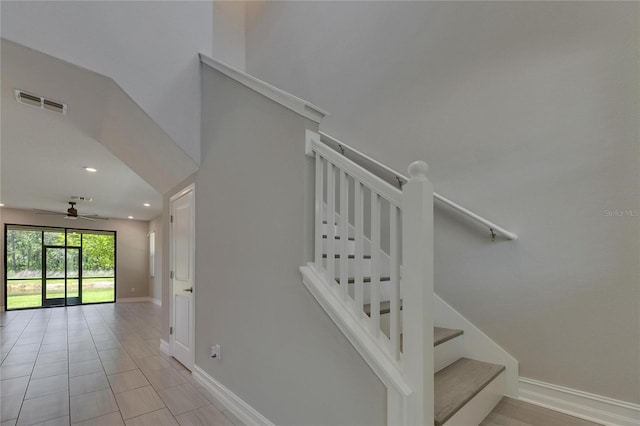 4899 Isola Ct, Wesley Chapel, FL 33543 - stairs featuring a ceiling fan, baseboards, recessed lighting, and tile patterned flooring