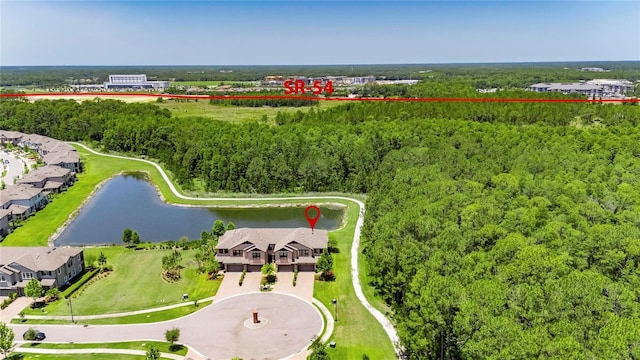 4899 Isola Ct, Wesley Chapel, FL 33543 - drone / aerial view of a heavily wooded area and a large body of water