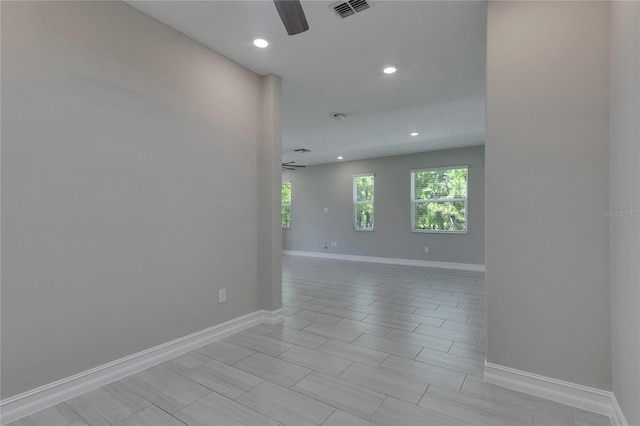 4899 Isola Ct, Wesley Chapel, FL 33543 - spare room with a ceiling fan, baseboards, and recessed lighting