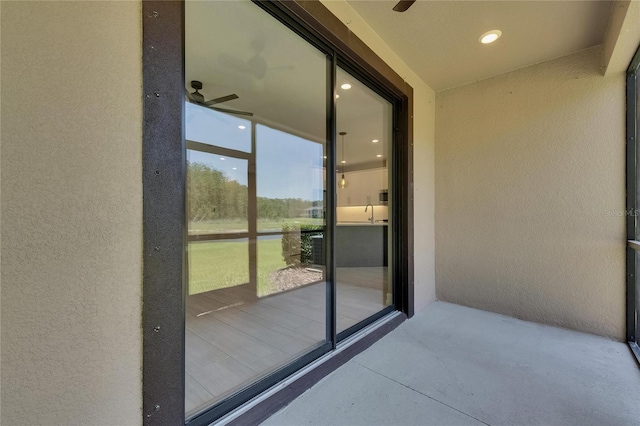 4899 Isola Ct, Wesley Chapel, FL 33543 - balcony with a ceiling fan