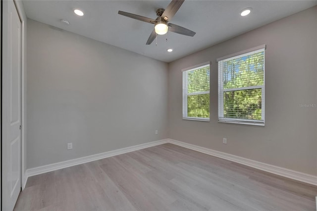 4899 Isola Ct, Wesley Chapel, FL 33543 - unfurnished room featuring light wood-style floors, a ceiling fan, baseboards, and recessed lighting
