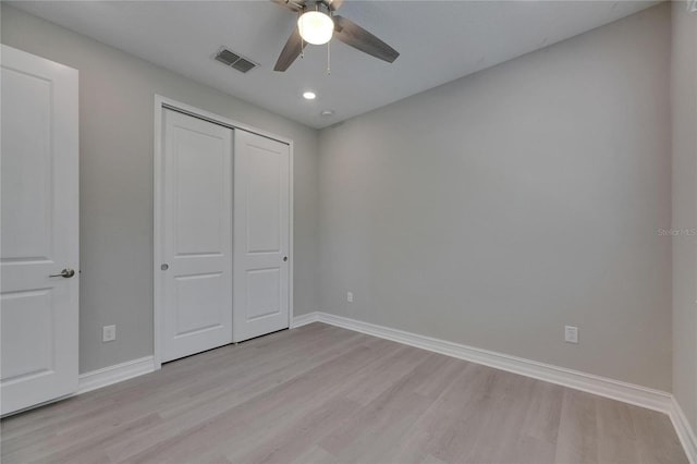 4899 Isola Ct, Wesley Chapel, FL 33543 - unfurnished bedroom featuring light wood-style flooring, baseboards, a closet, recessed lighting, and ceiling fan