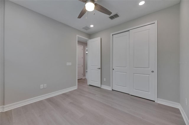 4899 Isola Ct, Wesley Chapel, FL 33543 - unfurnished bedroom featuring baseboards, light wood-type flooring, recessed lighting, a closet, and ceiling fan