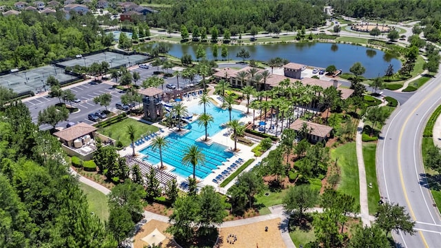 4899 Isola Ct, Wesley Chapel, FL 33543 - bird's eye view of a pool area and a nearby body of water
