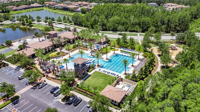 4899 Isola Ct, Wesley Chapel, FL 33543 - aerial view of a pool and a nearby body of water