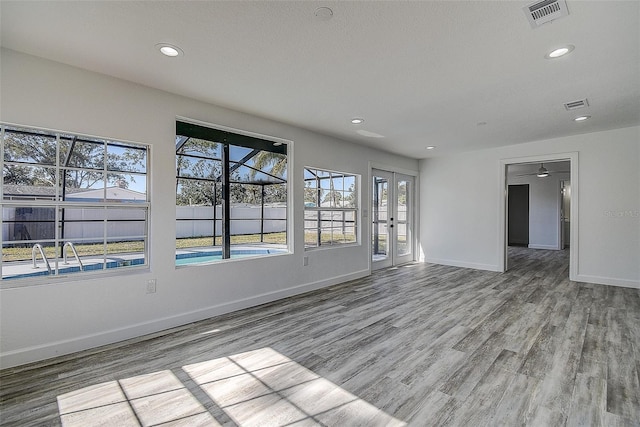 empty room featuring hardwood / wood-style flooring