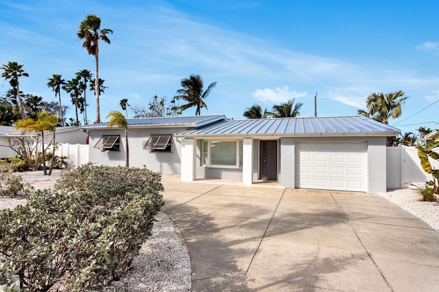 single story home with a garage