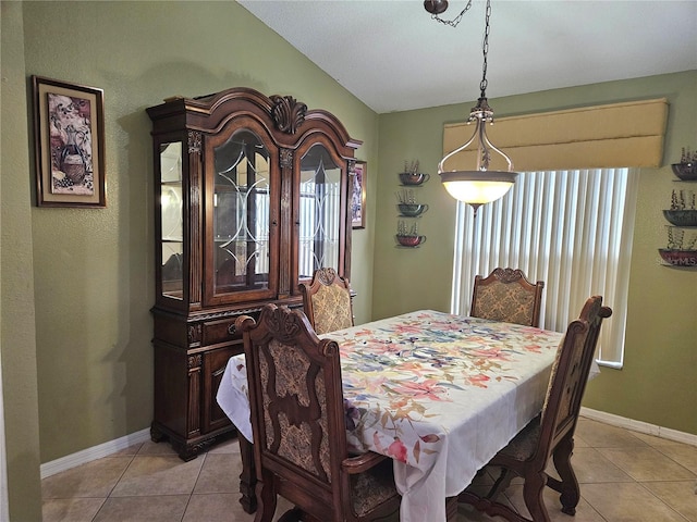 dining space with a healthy amount of sunlight and light tile patterned flooring