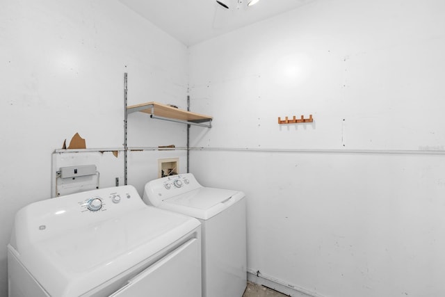 clothes washing area featuring washer and clothes dryer