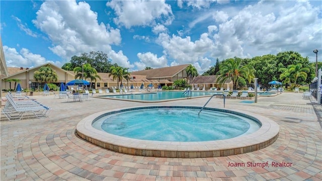 community pool featuring a patio