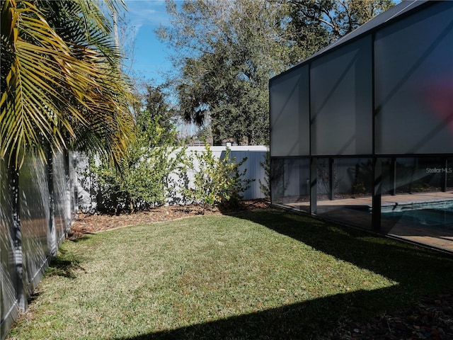 5709 Camila Song Ln, Tampa, FL 33625 - view of yard featuring fence and an outdoor pool
