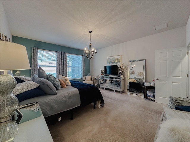 5709 Camila Song Ln, Tampa, FL 33625 - bedroom with carpet flooring, visible vents, a textured ceiling, and an inviting chandelier