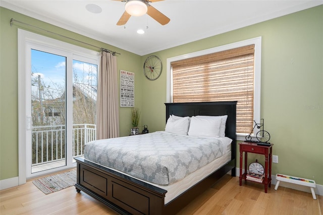 bedroom featuring ceiling fan, light hardwood / wood-style flooring, and access to outside