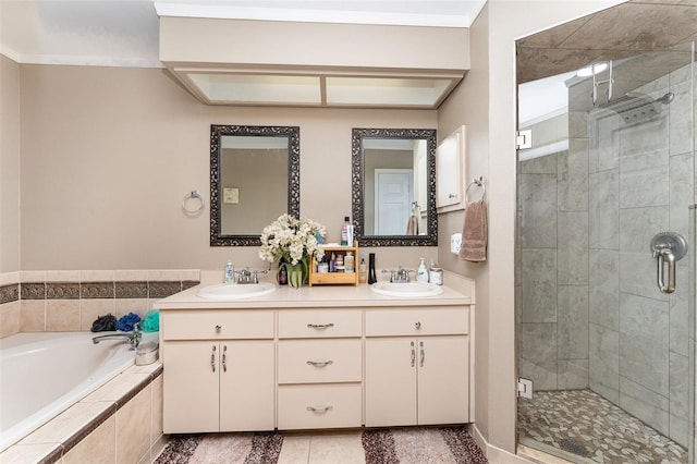 bathroom with vanity, tile patterned floors, and independent shower and bath