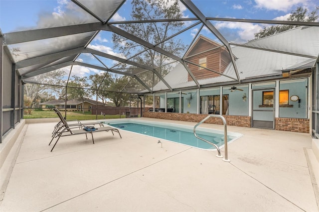 view of pool with a lanai and a patio area