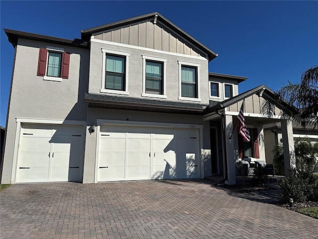 view of front of home with a garage