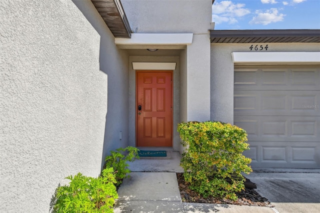 entrance to property with a garage