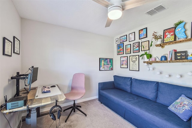 office area featuring ceiling fan and carpet flooring