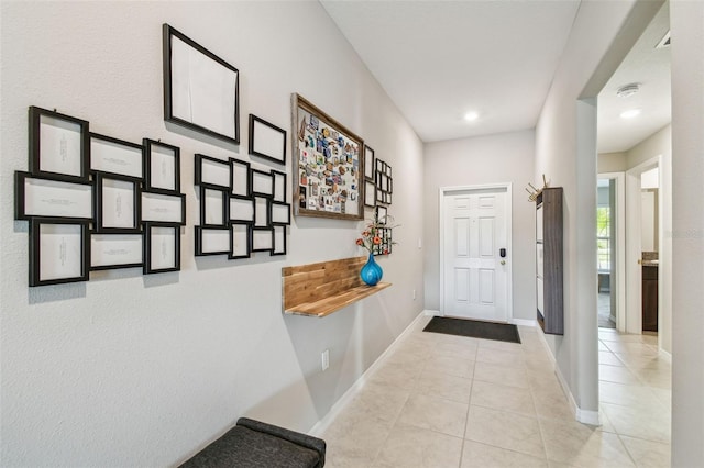 interior space with light tile patterned floors