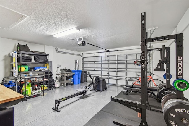 workout room with a textured ceiling