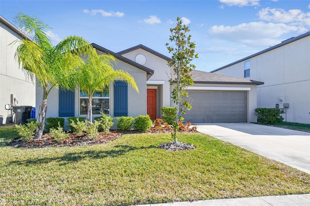 view of front of house featuring a garage and a front yard