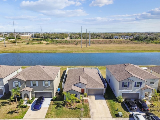 drone / aerial view featuring a water view