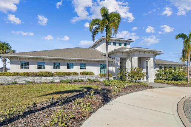 view of front of home with a front yard