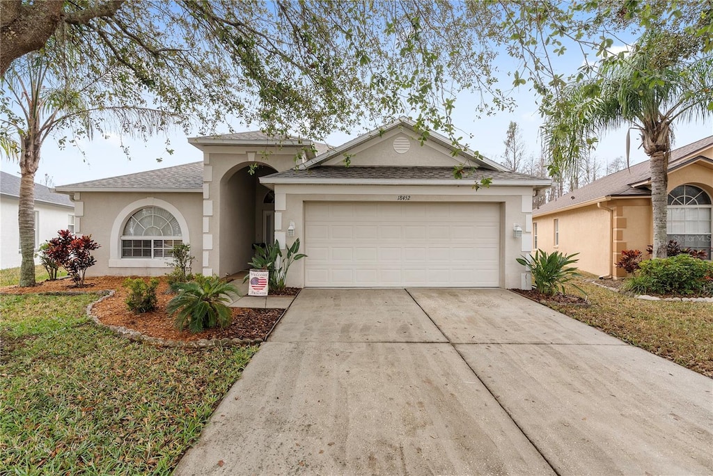 ranch-style house with a garage