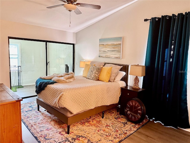 bedroom with vaulted ceiling, access to outside, hardwood / wood-style floors, and ceiling fan