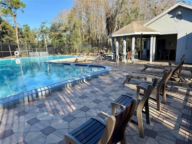 view of pool featuring a patio and a gazebo