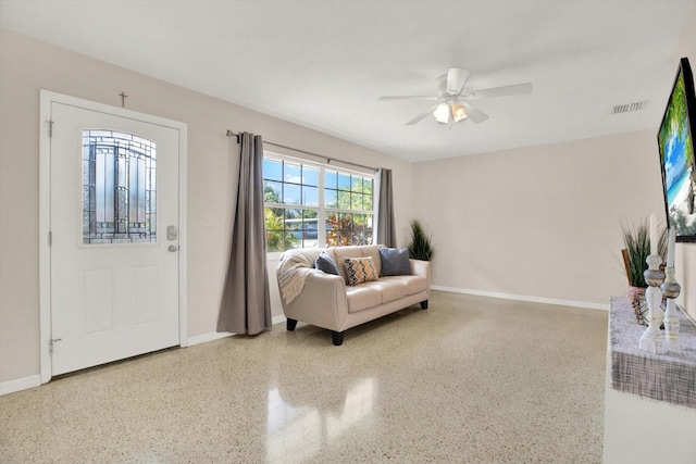 entryway featuring ceiling fan